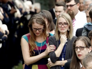 Cassidy Stay, center, is comforted after a funeral service last week for her parents and three siblings, who were shot to death allegedly by Ronald Lee Haskell. (AP Photo/David J. Phillip)